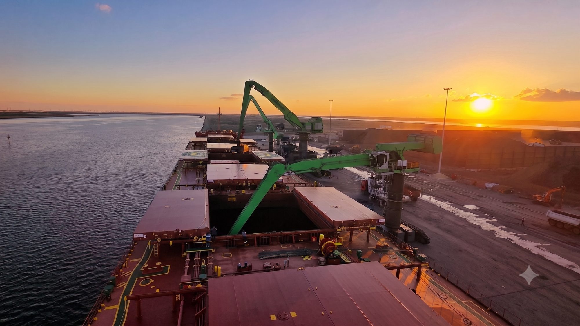 Sky Ports vessel being unloaded at sunset at East Port Said terminal